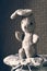 Vintage toy rabbit.Old vintage soft toy hare sits in old white chair
