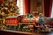 Vintage toy train in red and green parked by decorated Christmas tree creating festive holiday scene