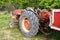 A Vintage Tractor and Red Tariler