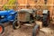 Vintage tractors parked in a barn