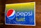 Vintage Trademark branding logo of Pepsi Twist was a lemon flavored cola.