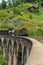 Vintage train on nine arches Bridge in highlands near Ella, Sri Lanka