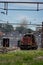 Vintage train is travelling along a railway track on a bright, sunny day