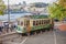 Vintage tramcar at stop alongside the River Douro in Porto, Portugal