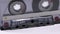 Vintage Transparent Audio Cassette Rotates on White Background