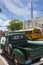 Vintage truck, yellow school bus and Tower Theatre in Little Havana, Miami, Florida