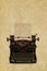 Vintage typewriter in front of a sepia background