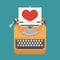 Vintage typewriter and red heart on paper sheet