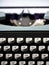 Vintage typewriter, writer or author`s tool, inspiration and creativity. On a black background