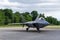 Vintage US Airforce F22 Fighter jet in a landing zone