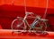 A vintage very old and used hanging bike as a decoration in a store .Nafplion city, Greece