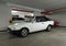 Vintage veteran rare white roadster car Ford Escort 1.4 Ghia parked