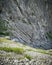 Vintage view of narrow and difficult rocky trekking trail across mountain cliffs and mountains at Tirol region, Austria