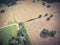 Vintage view Texas farmland prairie field bale hay on sunny day