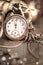 Vintage watch on abstract vintage background showing five to twelve