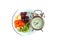 Vintage watch and healthy fruit platter, organic food and fruit and vegetable vitamins. The concept of nutrition, healthy food.