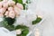 Vintage wedding table decorations with roses, candles cutlery