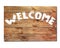 Vintage Welcome wooden sign isolated on white background.