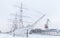 Vintage white sailing ship is moored in Turku in winter