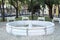 Vintage white stone water fountain in the public garden, Lisbon, Portugal