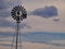 Vintage Windmill Silhouetted in Warm Sunset