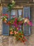 Vintage window with open wooden shutters