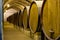 Vintage wine cellar with old oak barrels, production of fortified dry or sweet marsala wine in Marsala, Sicily, Italy