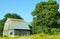 Vintage wood barn with metal gambrel roof