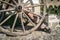 Vintage wood bullock wheel with sun shine summer, Matera Italy