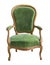 Vintage wooden armchair upholstered in green velvet isolated on white background.