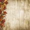 Vintage wooden background with autumn rowan and leaves