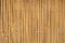 Vintage Wooden bamboo Background. Thin cane bamboo tied together with wire background