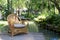 Vintage wooden chairs resting on the pier in the garden