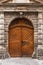 Vintage wooden door, stone house. Old Europe