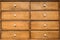 Vintage wooden drawers with white enamel knobs