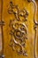 Vintage wooden hand-carved door, close-up