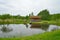 Vintage wooden log sauna by the pond in the Museum of Pushkin Mi