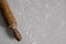 Vintage Wooden Rolling Pin on a Flour Covered Table