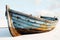 Vintage wooden rowboat exudes coastal charm, evoking nautical allure