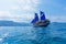 Vintage Wooden Ship with Blue Sails