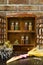 Vintage Wooden Spice Rack or Storage Cabinet and six glass bottles