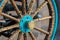 Vintage wooden spoke car wheel. Close-up of wood spokes