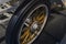 Vintage wooden spoke car wheel. Close-up of wood spokes on a classic vehicle