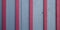 Vintage wooden striped painted wall texture grey rustic wood background gray with pink red stripes