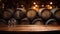 Vintage wooden table in wine cellar on old barrels background, empty brown counter in restaurant, bar or cafe. Wood casks in