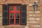 Vintage wooden window on the ancient facade