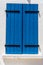 Vintage wooden window painted in blue