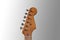 Vintage worn electric guitar head close up with retro tuners