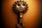 vintage wrench with round decorated head on brown background
