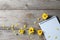 Vintage yellow chrysanthemums placed on the table old wooden with book diary